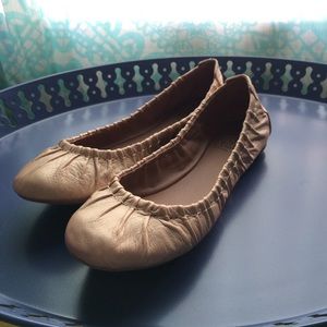 Metallic beige flats