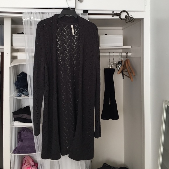 Gray knit long sweater.