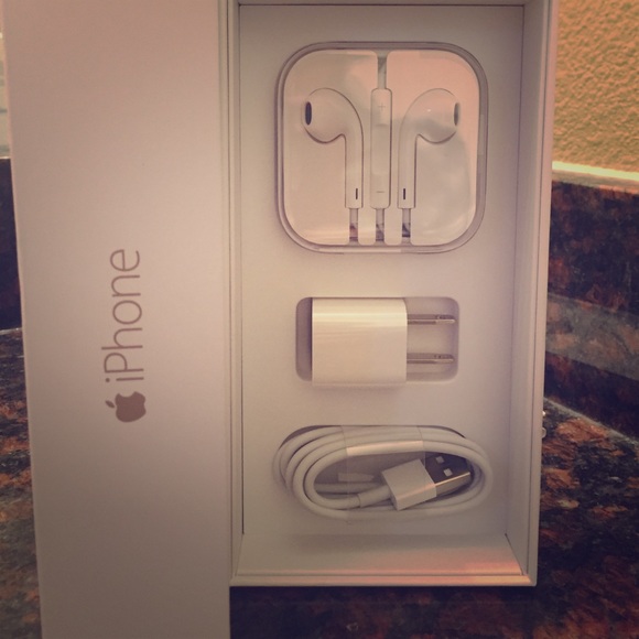 Brand new Apple charger and headphones