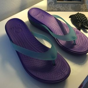 Purple and Teal Crocs flip flops