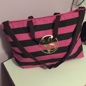 Vs cross body tote with handles.