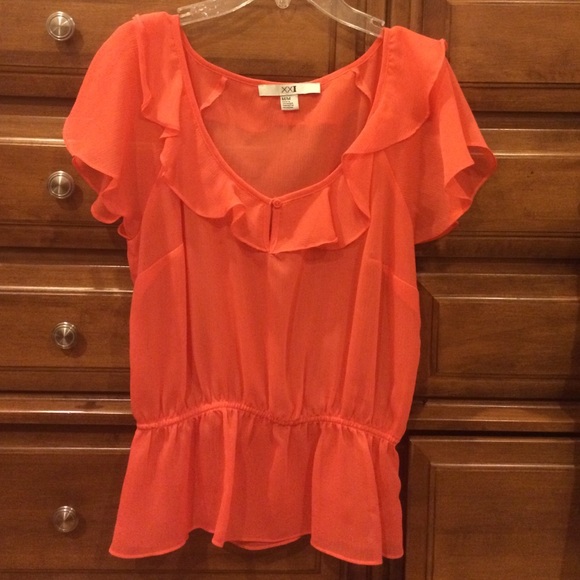 Ruffled sheer orange blouse