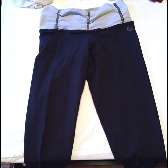 Lulu lemon black yoga pants; white at the top.