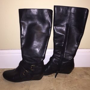 Black hidden wedge riding boots with wide calf