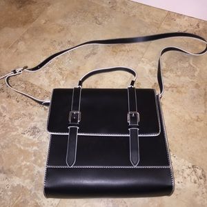 Black and white shoulder bag with buckle detail