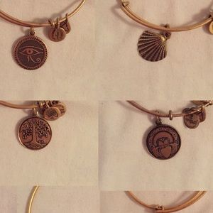 Alex and Ani bracelets in gold