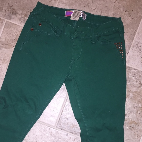 Green skinny jeans