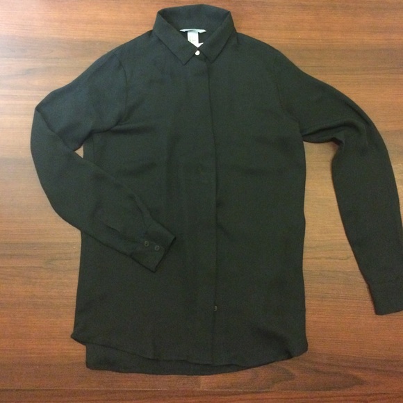 Cute black silky blouse. Great for work!