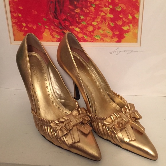 BCBGirls metallic gold pumps