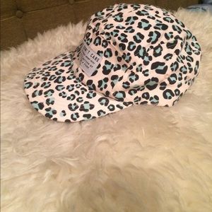 "JUST DON'T CARE" black/blue cheetah print cap