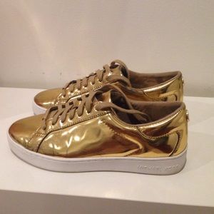 Gold Michel Kors shoes women's size 7.
