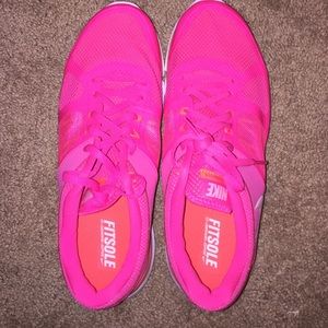Brand new pink running Nike shoes