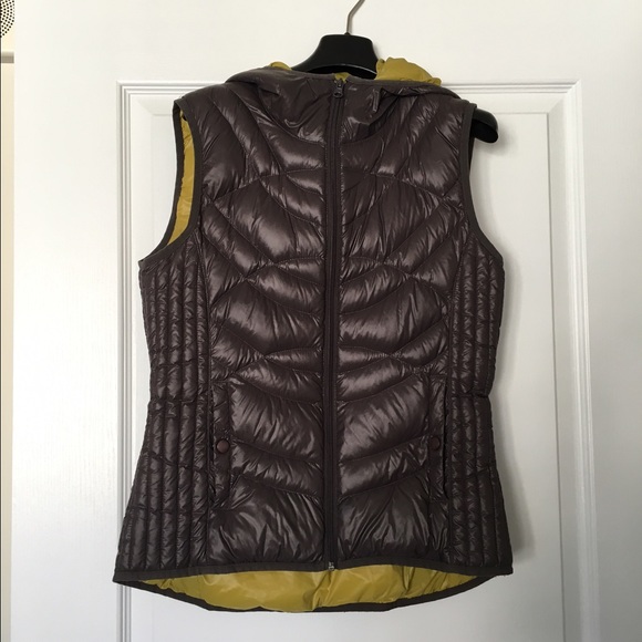 Like NEW. Down hooded vest.  Feather light & warm!