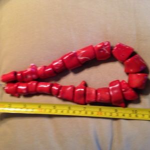 Coral, glass, bone and she'll African beads.