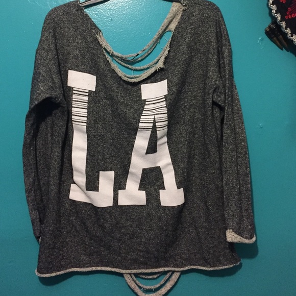 LA sweater fringe back