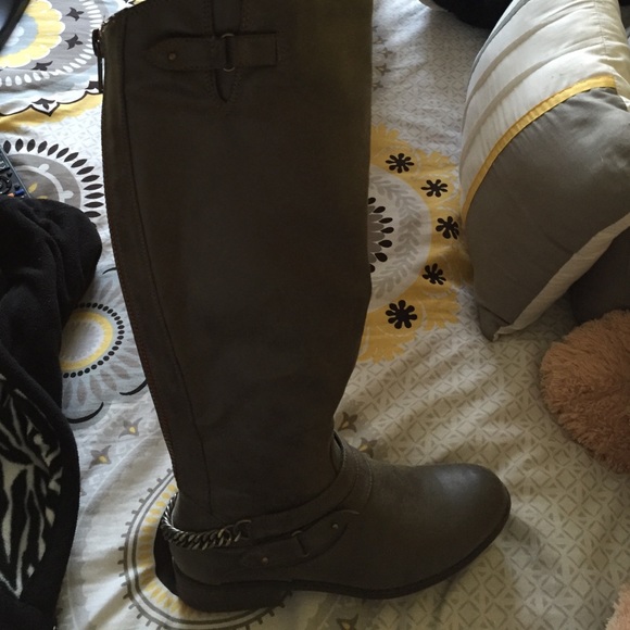 Tall greyish boots