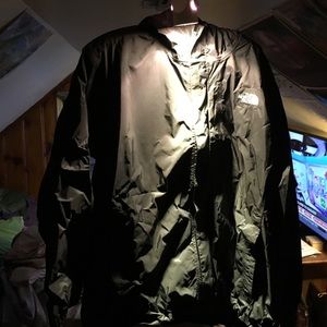 The North Face black shell jacket.