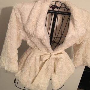 Faux fur coat with belt