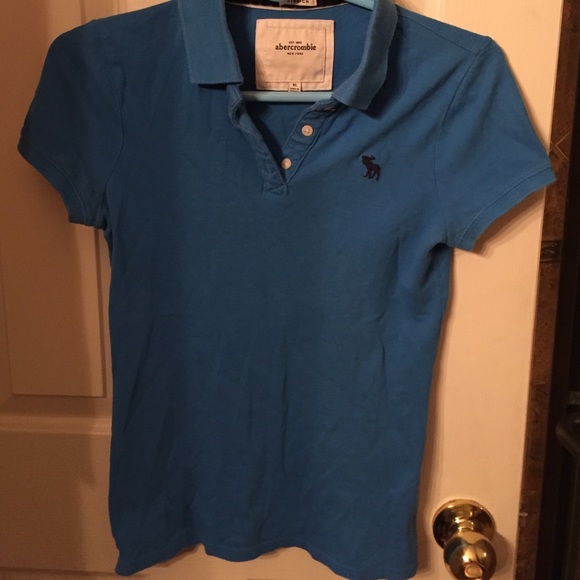 Blue Polo with a free gold sparkly headband!