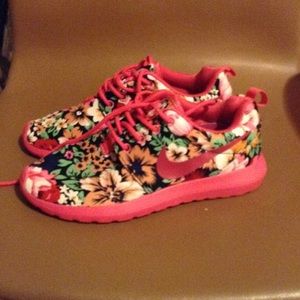 Hot pink and floral Nike roshes