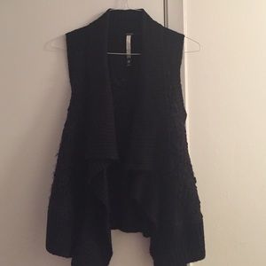 Black sweater vest