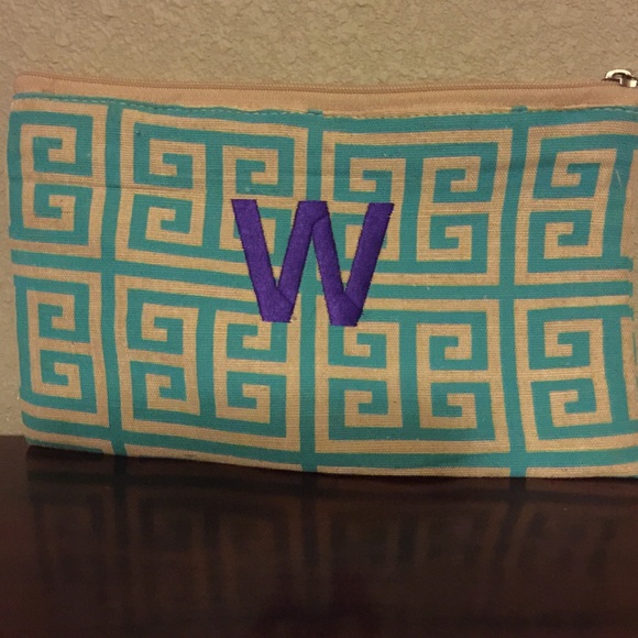 Monogrammed burlap make-up zippered bag.