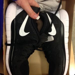 Brand new black nike shoes