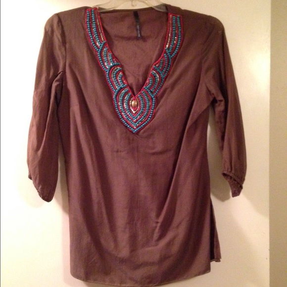 Brown top with great turquoise bead work