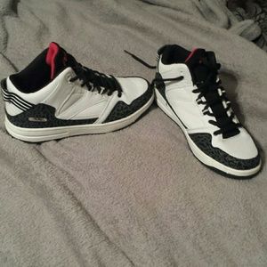 Boy high top Fubu tennis shoes