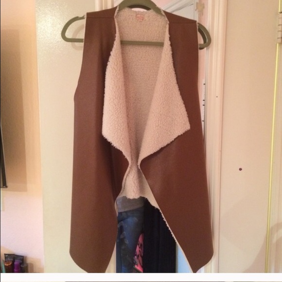 Faux fur vest and Burberry top