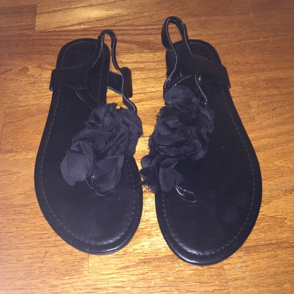 Black sandals. Flower detail. Never worn.