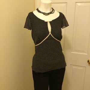 Vintage inspired B&W polkadotted cap sleeve blouse