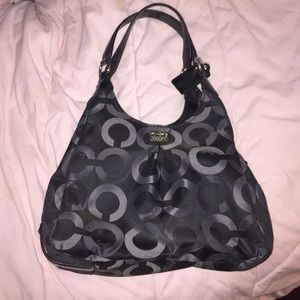 Brand new. Black and gray exterior. Blue interior.