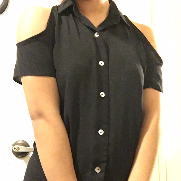 Black shirt with cut out detail on shoulders