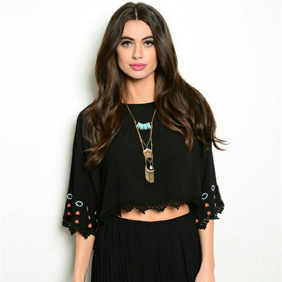 Black top with orange and blue flowers embroidery