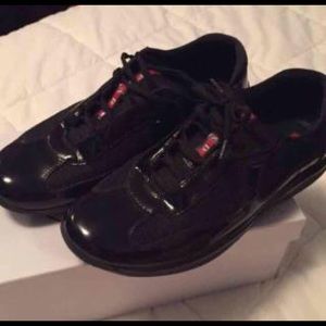 Black, patent leather Pradas