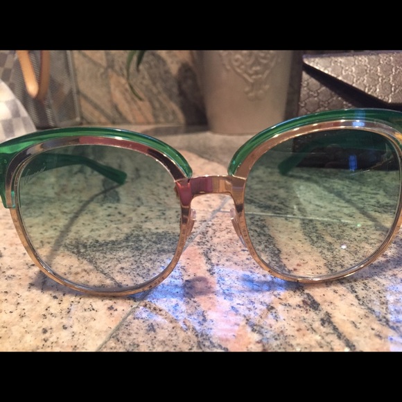 Gucci sunglasses in green.