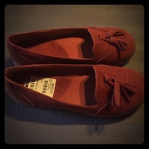 Burnt orange, suede, tasseled loafers