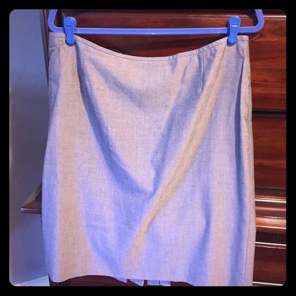 Grey suit skirt with ruffle pleating in back.