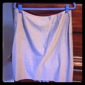 Grey suit skirt with ruffle pleating in back.