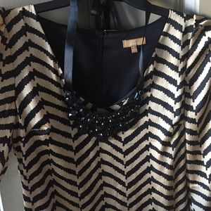 Dress size Small comes with attached necklace