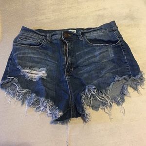 High rise ripped jean shorts. Size: Large.
