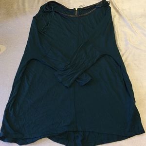 Blouse long sleep semi loose top but fitted arms.