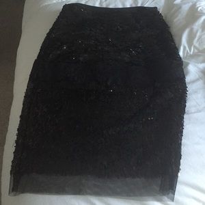 Gorgeous black BCBG over the knee length skirt