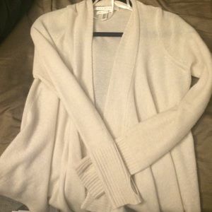 White cashmere cardigan sweater.