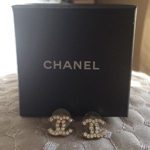 Authentic CHANEL crystal logo earrings.
