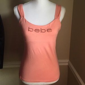 SOLD Bebe, size large,coral, jeweled logo tank.