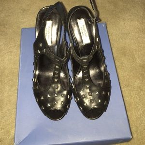 Black leather stud heel. Never worn
