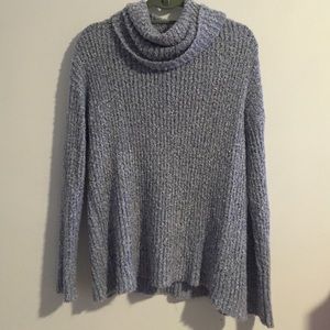 Flowy, light blue turtleneck sweater