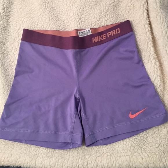 purple Nike pro compression shorts